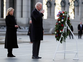 U.S. President Joe Biden and First Lady Jill Biden visit the World War Two Memorial Site on the anniversary of the attacks on Pearl Harbor, Hawaii, at the National Mall in Washington, December 7, 2021.