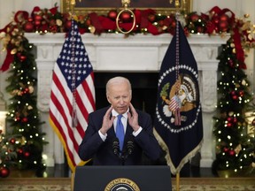 U.S. President Joe Biden speaks about the omicron variant of the coronavirus in the State Dining Room of the White House, Dec. 21, 2021 in Washington, D.C.