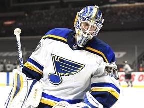 Jordan Binnington of the St. Louis Blues reacts after a goal during a 4-3 Los Angeles Kings overtime win at Staples Center on March 6, 2021 in Los Angeles, Calif.