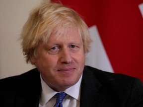 British Prime Minister Boris Johnson is seen at 10 Downing Street in London, December 16, 2021.
