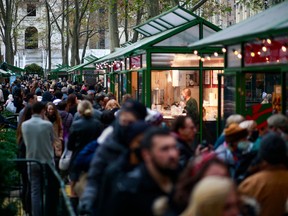 People visit the Winter Village in Bryant Park, New York on December 5, 2021.