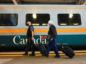 VIA Rail passengers disembark at Union Station in Toronto, Oct. 6, 2021.