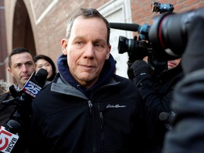 Charles Lieber leaves federal court after he and two Chinese nationals were charged with lying about their alleged links to the Chinese government, in Boston January 30, 2020.