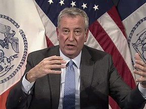 In this image taken from video, New York Mayor Bill de Blasio speaks during a virtual press conference, Thursday, Dec. 2, 2021, in New York.
