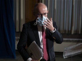 Kieran Moore, Ontario's Chief Medical Officer of Health, attends a media briefing at the Ontario Legislature in Toronto, Friday, Dec. 17, 2021.