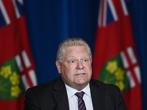 Premier Doug Ford holds a news conference regarding the plan for Ontario to open up at Queen's Park during the COVID-19 pandemic in Toronto, May 20, 2021.