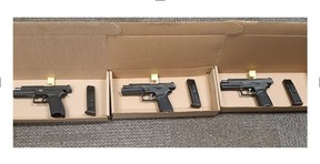Guns seized by Durham Regional Police at an Oshawa residence on Dec. 25, 2021.
