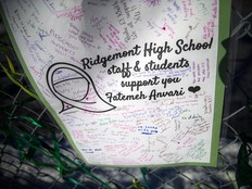 A group gathered in solidarity with Fatemeh Anvari, by tying green ribbons onto the fence of Chelsea Elementary School, Dec. 12, 2021. Anvari, who until recently was a part-time homeroom and language arts teacher at Chelsea Elementary School and was removed from her classroom for wearing a hijab because of the province’s Bill 21 law.