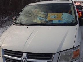 An Amazon driver had so many packages, he could barely see.