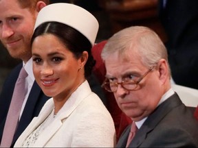Meghan, Duchess of Sussex sits with Prince Harry, left, and Prince Andrew, right, during the Commonwealth Service at Westminster Abbey in London, Monday, March 11, 2019. (Kirsty Wigglesworth - WPA Pool/Getty Images)