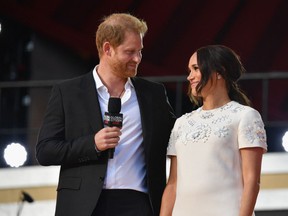 Britain's Prince Harry and Meghan Markle speak during the 2021 Global Citizen Live festival at the Great Lawn, Central Park on September 25, 2021 in New York City. (Photo by Angela Weiss / AFP) (Photo by ANGELA WEISS/AFP via Getty Images)