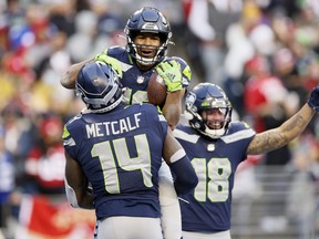 Star Seattle Seahawks wideouts Tyler Lockett and touchdown catch with DK Metcalf could play a home game in either Calgary or Edmonton, where the team's popularity is soaring.