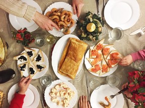 Family eating seafood, tapas and more on Christmas