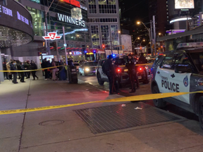 Toronto Police at the scene of a stabbing at Yonge and Dundas Sts. on Wednesday, Dec. 22, 2021.