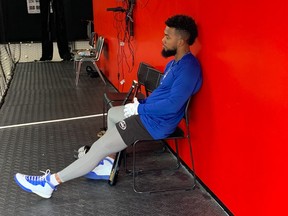 Blue Jays slugger Teoscar Hernandez takes a break after taking his cut in the batting cage on Tuesday in Clearwater, Fla.