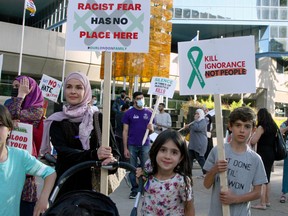 Protesters gather in front of London, Ont. city hall for a national call for action against islamophobia on June 18, 2021. Brendan Miller/Postmedia