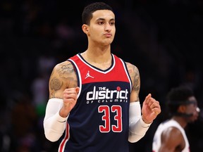 Kyle Kuzma of the Washington Wizards reacts to a 119-116 overtime win over the Detroit Pistons at Little Caesars Arena on Dec. 8, 2021 in Detroit.