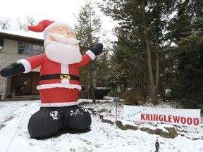 About 50 inflatable Santa's can be spotted on the lawns and roofs of homes on Inglewood Dr. - or Kringlewood - as it is dubbed. The festive feature in the Moore Park area of Toronto has been going strong for a few years now with neighbours loving it. on Thursday December 9, 2021. Jack Boland/Toronto Sun/Postmedia Network