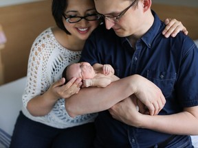Calgary MP Tom Kmiec and his wife Evangeline hold their newborn daughter Lucy-Rose.