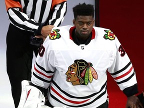 Malcolm Subban of the Chicago Blackhawks is pictured standing during the U.S. national anthem before the Game 1 of the Eastern Conference qualification round prior to the 2020 NHL Stanley Cup Playoffs at Rogers Place on Aug. 1, 2020 in Edmonton.