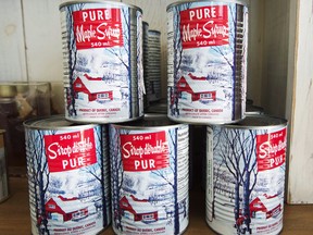 Maple syrup cans are seen at a sugar shack on February 10, 2017 in Oka, Quebec.