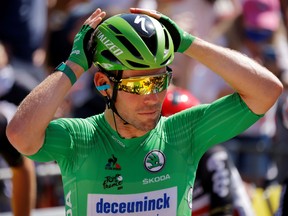 Deceuninck–Quick-Step rider Mark Cavendish of Britain wearing the green jersey during stage 21 of the Tour de France on July 18, 2021.