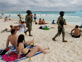 Members of the Navy patrol a beach resort as part of the vacation security in the tourist zone in Cancun by the government of Quintana Roo, Mexico December 5, 2021.