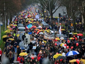 People protest against new measures to fight a record surge of COVID-19 infections, in Utrecht, Netherlands, Dec. 4, 2021.