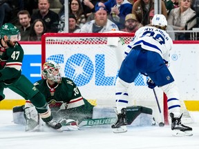 Minnesota Wild goalie Cam Talbot makes a save on Maple Leafs' forward William Nylander during the second period at Xcel Energy Center on Saturday, Dec. 4, 2021.