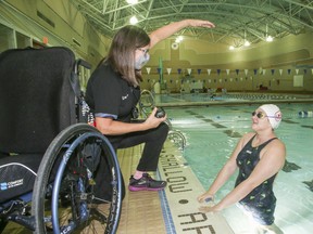 Canadian marathon swimmer and coach Vicki Keith (L) at Variety Village with Paralympic swimmer Ruby Stevens (R) on Friday, Dec. 17, 2021.