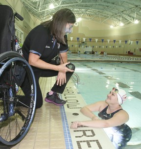 Canadian marathon swimmer and coach Vicki Keith (L) at Variety Village with Paralympic swimmer Ruby Stevens (R) on Friday, Dec. 17, 2021.