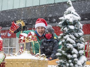 The Help Santa Toy Parade, in its 52nd year of operation, was able to create a smaller version of Ottawa's annual event to bring children and adults alike, many smiles, Saturday, Dec. 4, 2021.