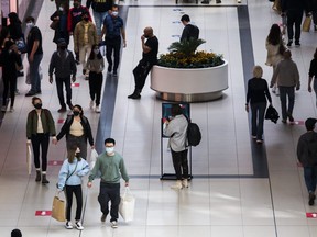 Shoppers at CF Toronto Eaton Centre in downtown in Toronto, Ont. on Sunday, October 17, 2021.