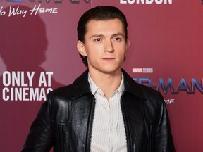 Tom Holland attends a photocall for "Spiderman: No Way Home" at The Old Sessions House in London, Sunday, Dec. 5, 2021.