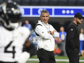 Urban Meyer of the Jacksonville Jaguars looks on during warm-ups prior to the game against the Los Angeles Rams at SoFi Stadium on December 5, 2021 in Inglewood, California.