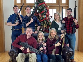 U.S. Rep. Thomas Massie (R-KY) in a Christmas photo of his family holding guns, in this image obtained from Twitter, posted on December 4, 2021.