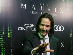 Keanu Reeves attends the Canadian premiere of The Matrix Resurrections on Dec. 16, 2021.