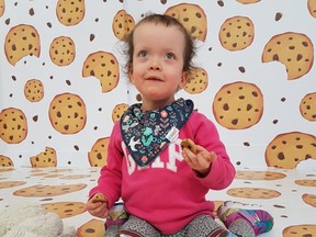 Willa Price, 5, who has Noonan spectrum syndrome and has been fed through a tube since birth, recently learned to swallow and has since been enjoying all sorts of tasty food. She is seen here at a children’s play zone.