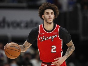 Chicago Bulls guard Lonzo Ball brings the ball up court against the Los Angeles Lakers during the first half at United Center.