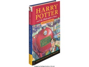 A first edition copy of J.K. Rowling's "Harry Potter and the Philosopher's Stone" that sold for $471,000 at auction in the United States is seen in an undated handout photo.