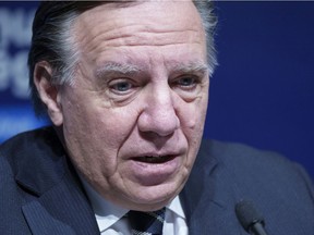 "When we hear hospitalizations will increase significantly over the next days and weeks, well, we have to act," Premier François Legault said.