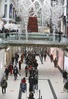 Last-minute Christmas shopping at the not-so-crowded Toronto Eaton Centre on Thursday, Dec. 23, 2021.