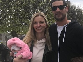 Michael Ciasullo is pictured with his wife, Karolina and his youngest daughter, Mila, in this Facebook photo. Brady Robertson, 21, has pleaded guilty in a Brampton courtroom to four counts of dangerous driving causing death in the crash that killed Ciasullo's wife and three daughters.