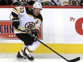 Brad Marchand of the Bruins skates during first period action as the Flames host the Bruins at the Saddledome in Calgary, Dec. 11, 2021.