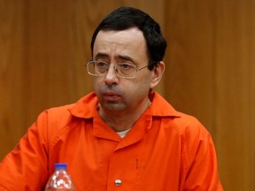 Larry Nassar, a former team USA Gymnastics doctor who pleaded guilty in November 2017 to sexual assault charges, sits in the courtroom during his sentencing hearing in the Eaton County Court in Charlotte, Michigan, U.S., February 2, 2018.