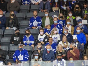 Leafs fans watch the Toronto Maple Leafs Alumni game at Budweiser Gardens in London, Ont. on Sunday, Oct. 3, 2021.