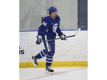 Toronto Maple Leafs Auston Matthews C (34) rolls out of the corner during practice in Toronto on Friday December 31, 2021. Jack Boland/Toronto Sun/Postmedia Network
