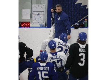 Toronto Maple Leafs head coach Sheldon Keefe at the chalkboard during practice in Toronto on Friday December 31, 2021. Jack Boland/Toronto Sun/Postmedia Network