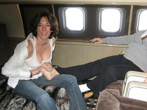 Ghislaine Maxwell rubs Jeffrey Epstein's feet on the plane dubbed the 'Lolita Express.'