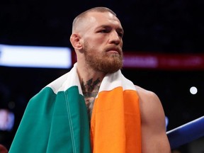 Conor McGregor makes his entrance before his fight against Floyd Mayweather Jr. in Las Vegas on Aug. 26, 2017.